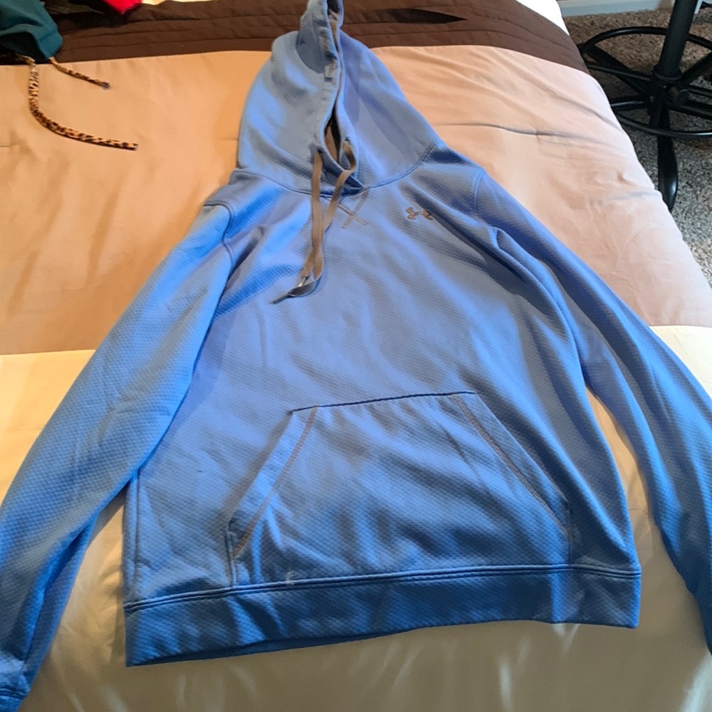 Blue Under Armour hoodie.